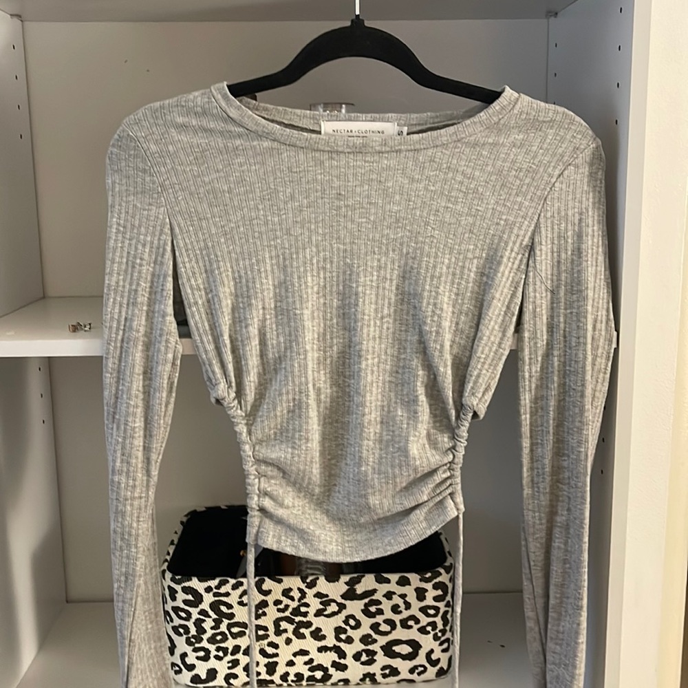 Long sleeve half open back adjustable top